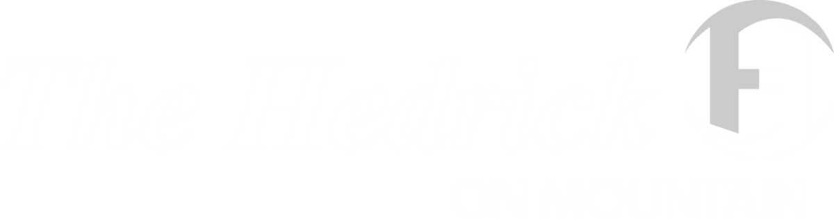 The logo for The Hedrick Group on Mountain.